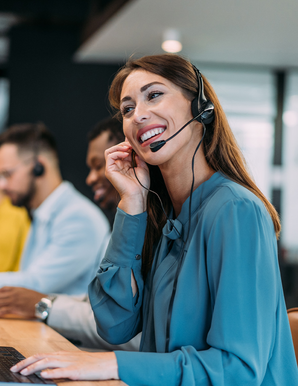 woman wearing headset smiling